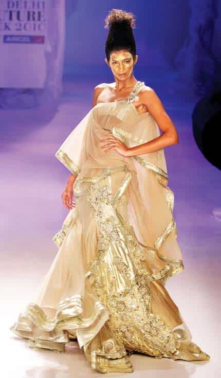 Gaurav Gupta gets his model to strut in a heavy, net lehenga but doesn’t add any jewellery Gaurav Gupta gets his model to strut in a heavy, net lehenga but doesn’t add any jewellery